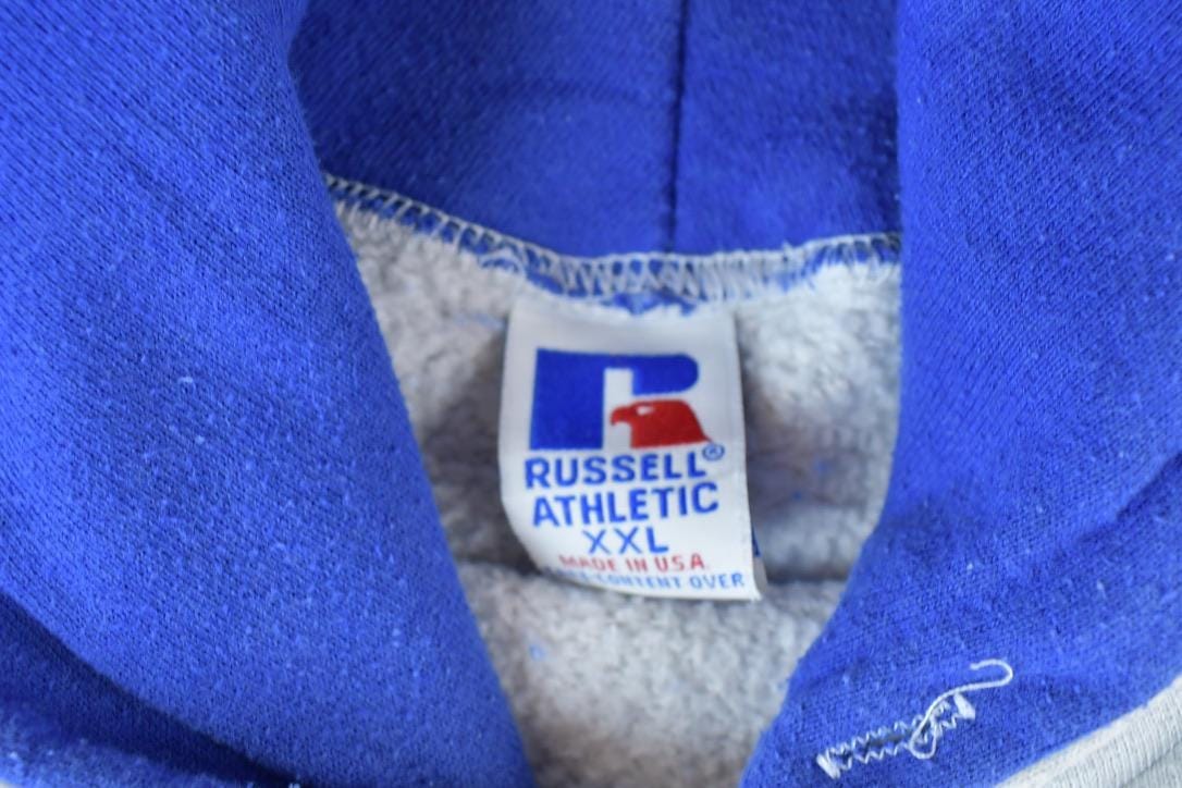 Vintage 1990s Russell Athletics Colour Block Graphic Hoodie Men's 2XL from propervintagecanada