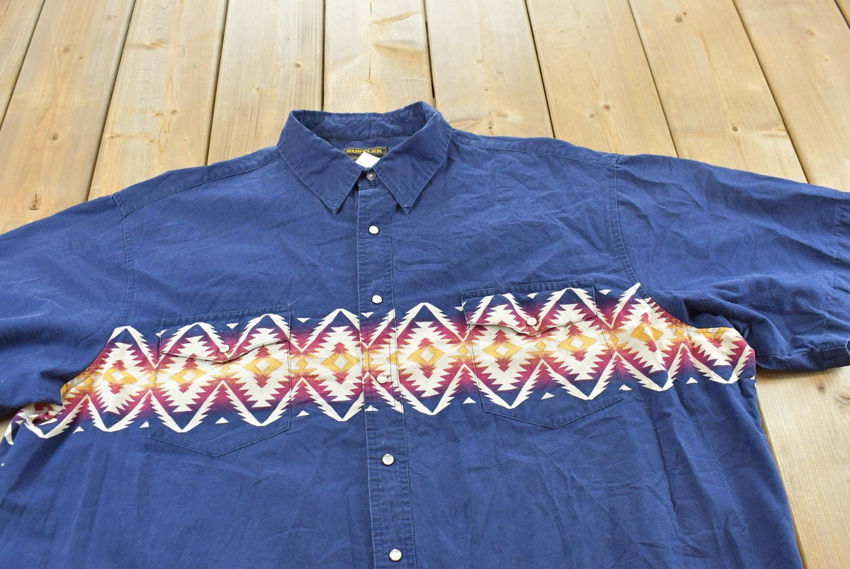 Vintage 1990s Rustler By Wrangler Western Theme Short Sleeve Button Up Shirt Men's 3XL from propervintagecanada