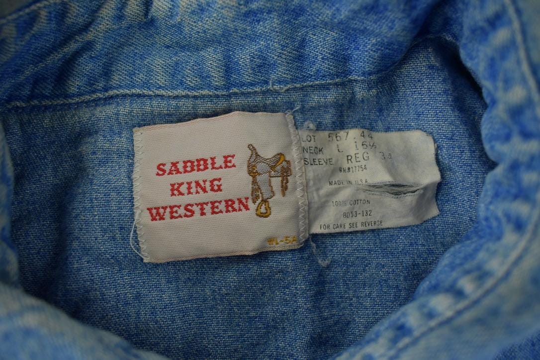 Vintage 1990s Saddle King Western Denim South Western Style Pearl Snap Button Up Rodeo Shirt Men's XL from propervintagecanada