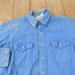 Vintage 1990s Saddle King Western Denim South Western Style Pearl Snap Button Up Rodeo Shirt Men's XL from propervintagecanada