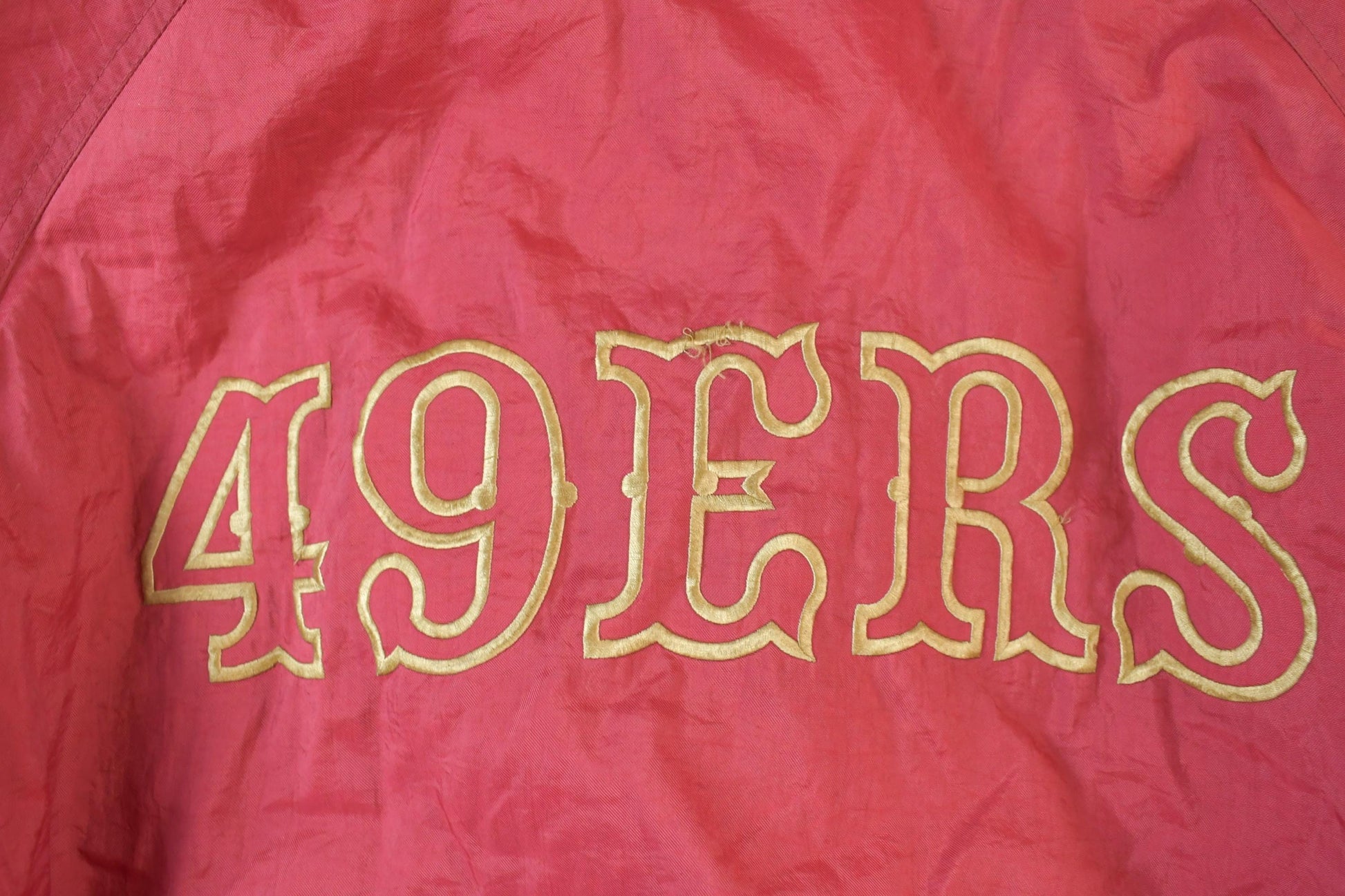 Vintage 1990s San Francisco 49ers Hooded NFL Game Day Football Jacket from propervintagecanada