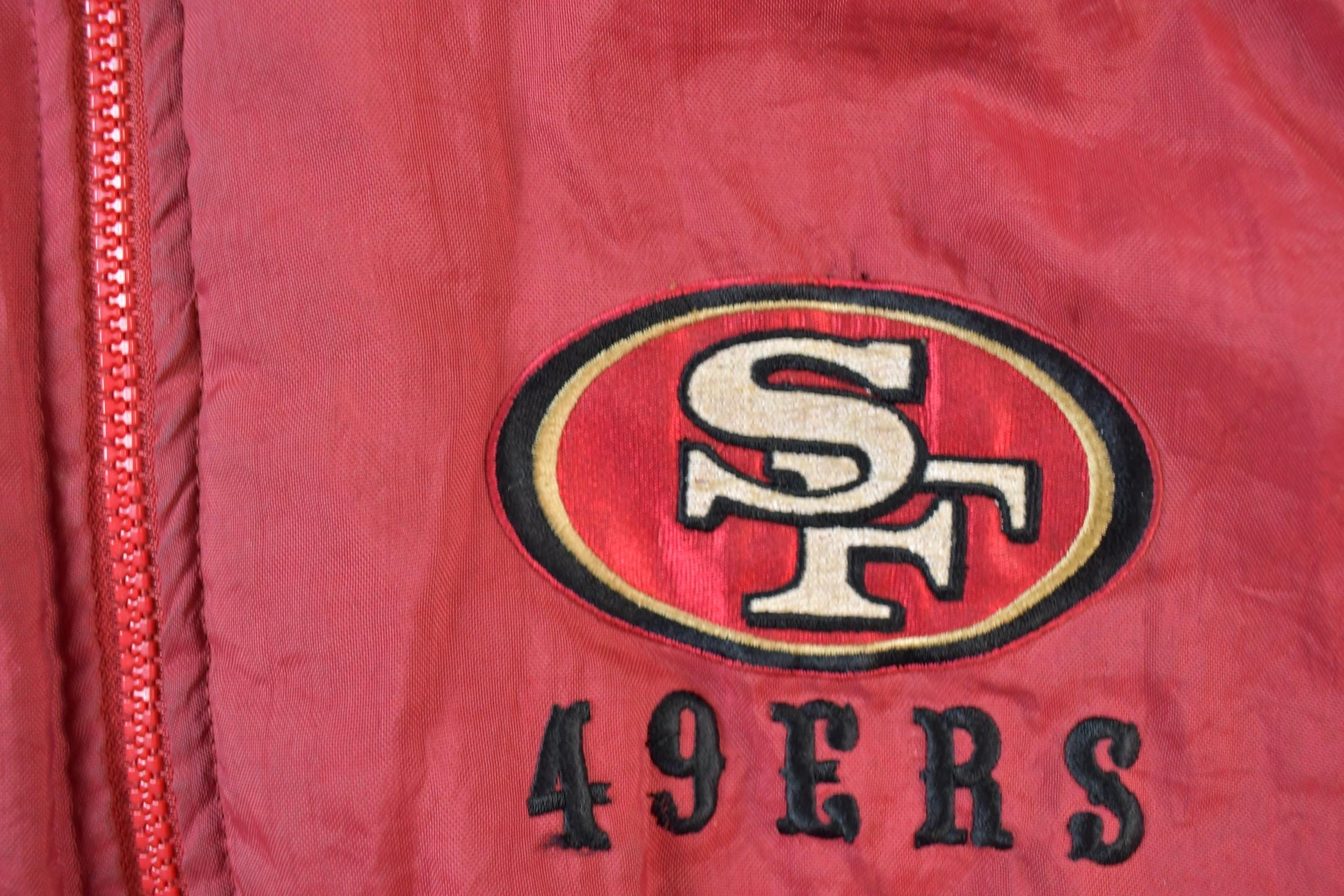 Vintage 1990s San Francisco 49ers Hooded NFL Game Day Football Jacket from propervintagecanada