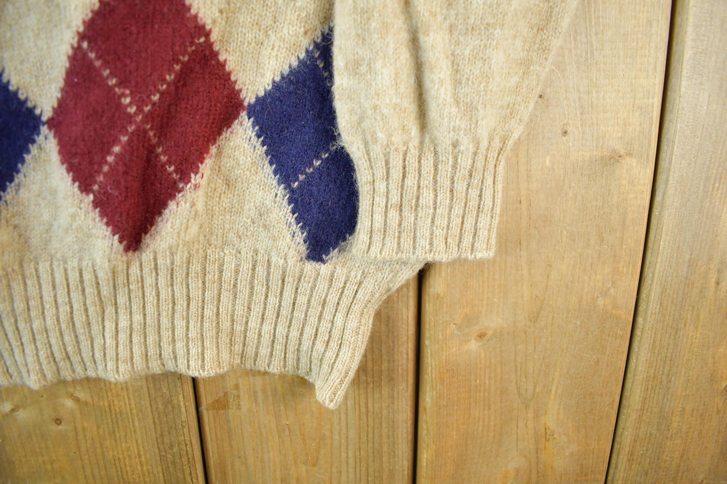 Vintage 1990s Schostal Wool Knit Argyle Pattern Collared Sweater Mens Large from propervintagecanada