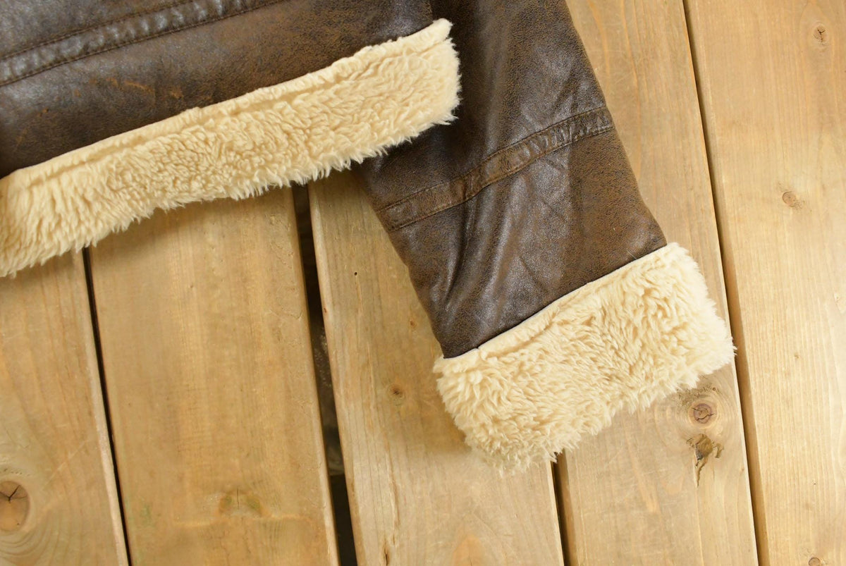 Vintage 1990s Scoop Faux Fur Shearling Coat Women's XL from propervintagecanada