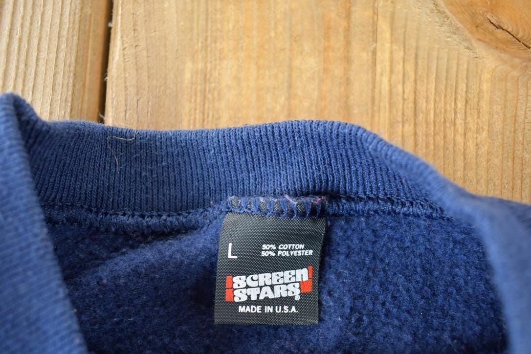 Vintage 1990s Screen Stars North Dakota Souvenir Crewneck Sweatshirt Made In USA Men's Small from propervintagecanada