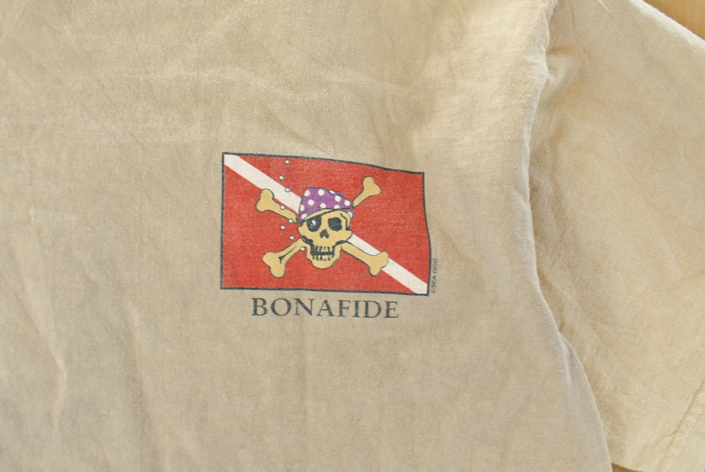 Vintage 1990s Sea Dog Sun Faded Souvenir Graphic Print T-Shirt Men's Large from propervintagecanada