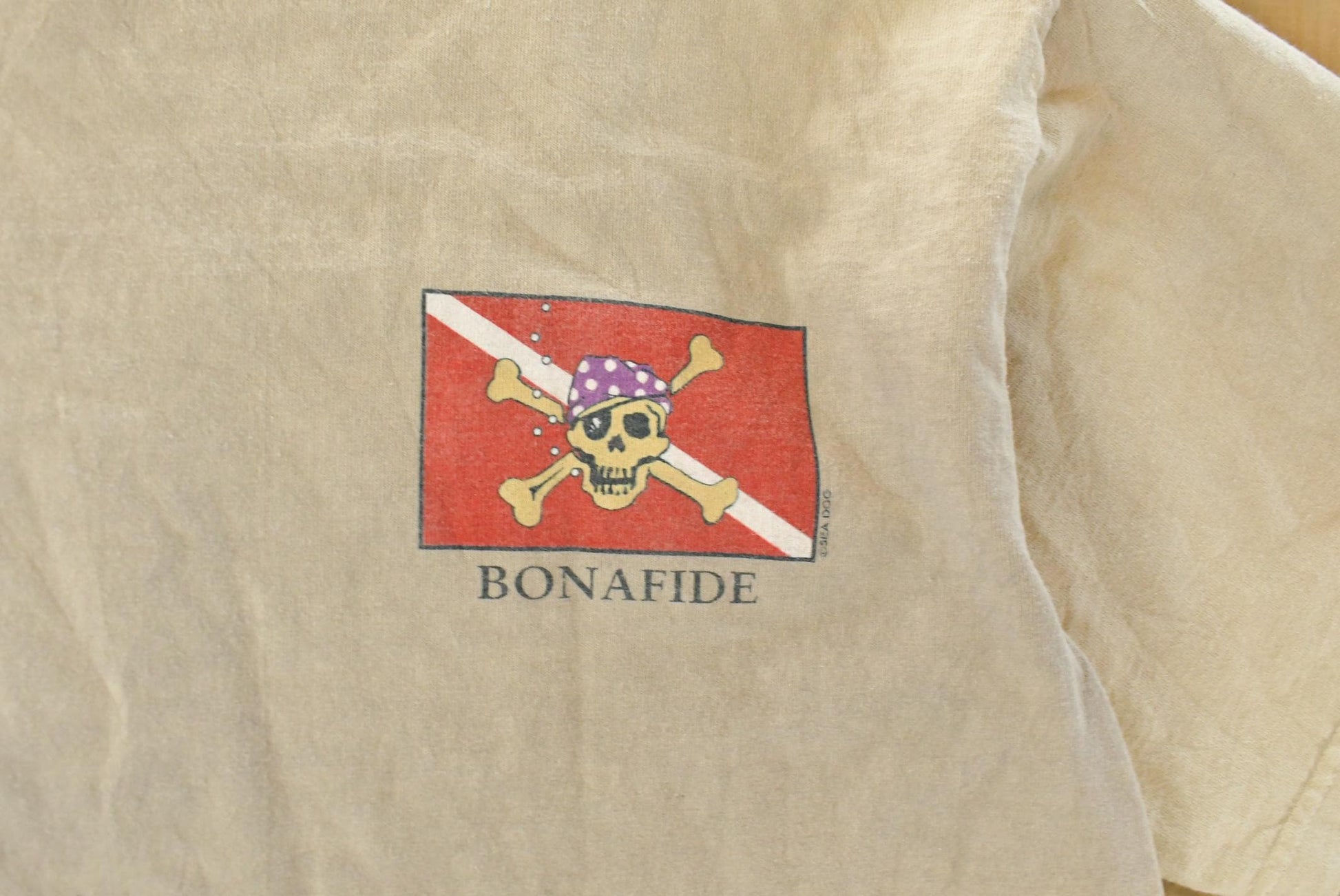 Vintage 1990s Sea Dog Sun Faded Souvenir Graphic Print T-Shirt Men's Large from propervintagecanada