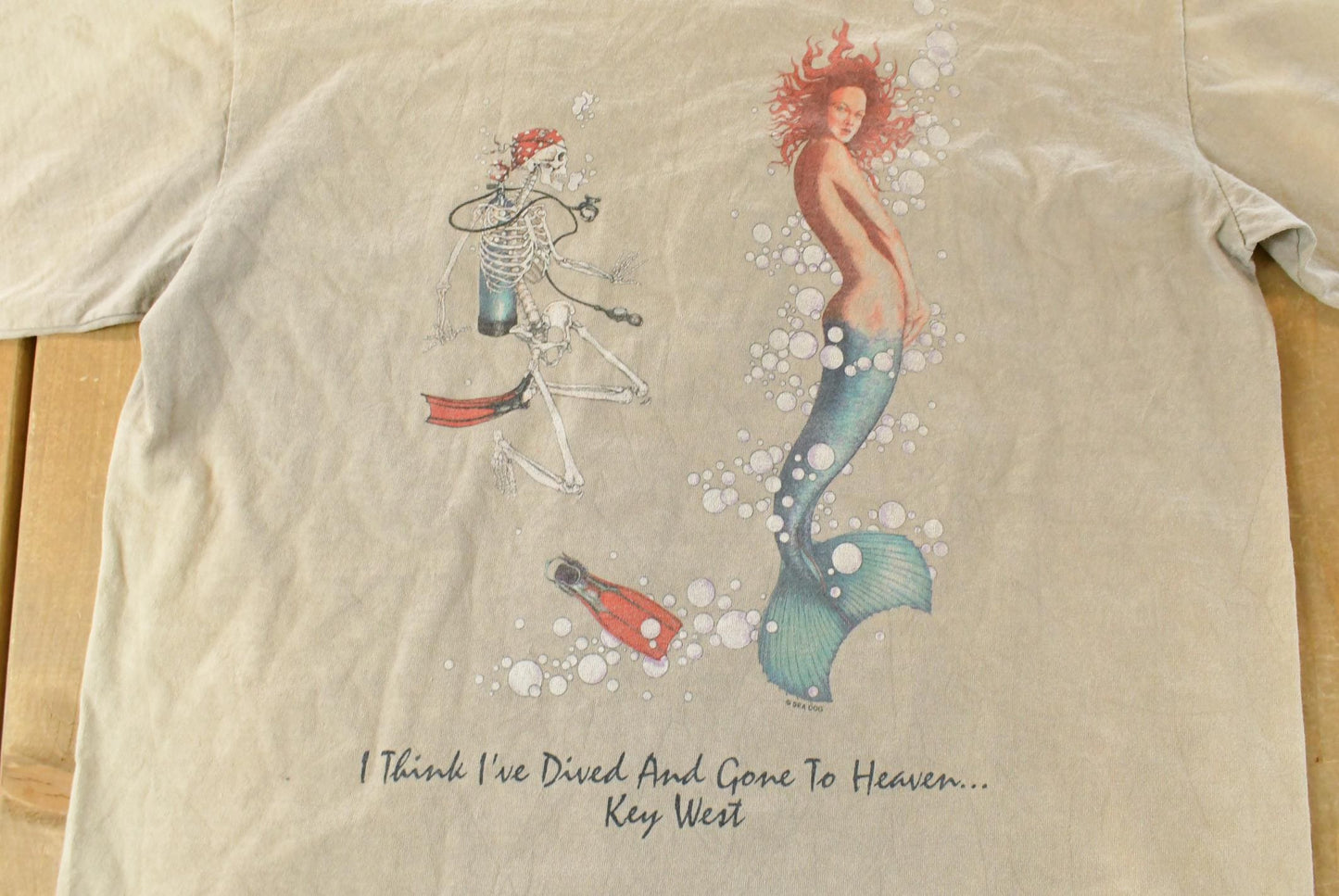 Vintage 1990s Sea Dog Sun Faded Souvenir Graphic Print T-Shirt Men's Large / 90s Mermaid Sea Life / Nature / Vintage Streetwear from propervintagecanada