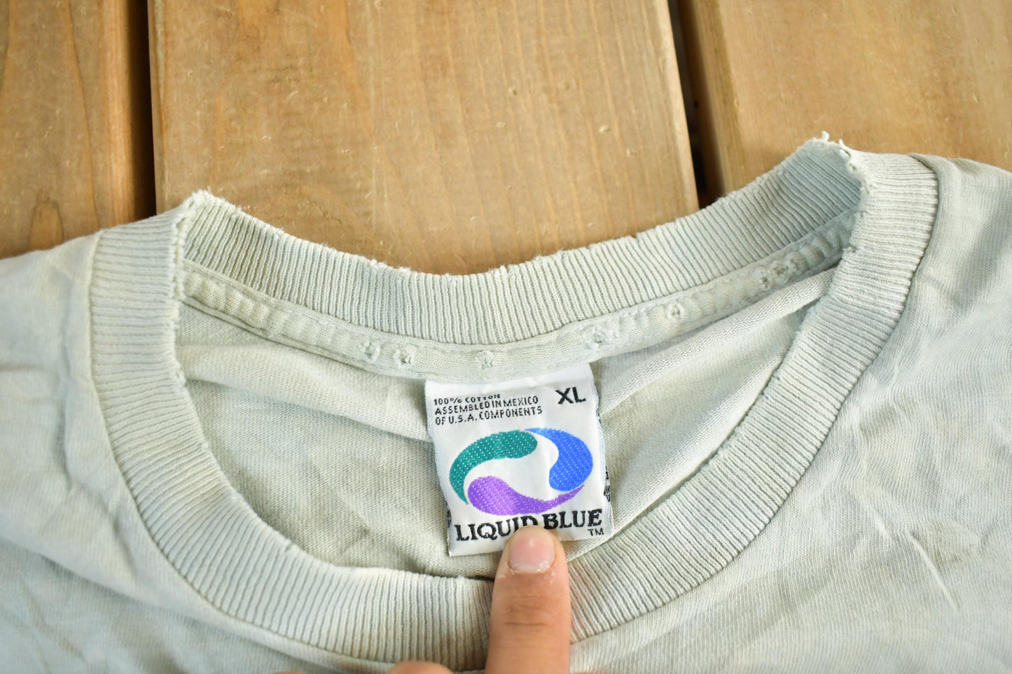 Vintage 1990s Seattle Seahawks Liquid Blue NFL Logo Graphic T-Shirt Men's XL from propervintagecanada