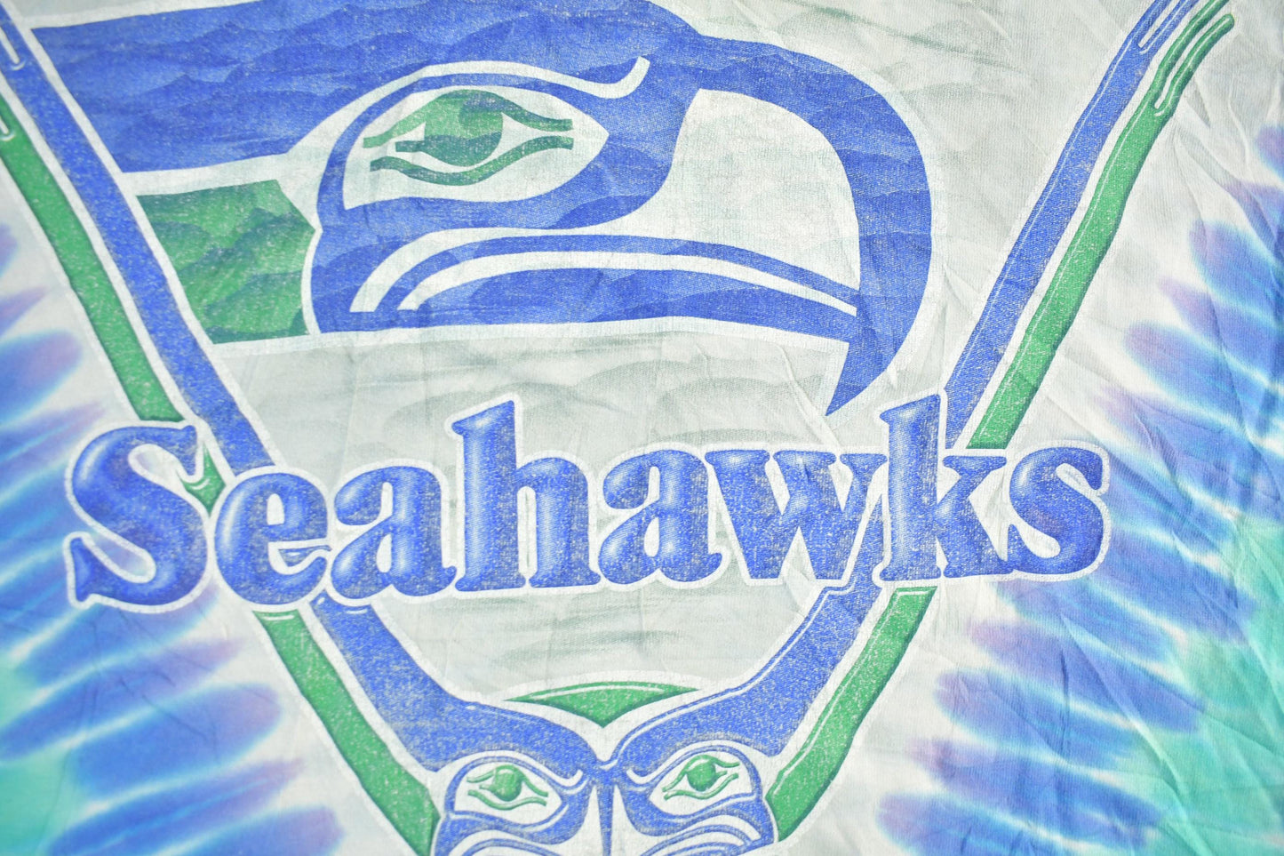 Vintage 1990s Seattle Seahawks Liquid Blue NFL Logo Graphic T-Shirt Men's XL from propervintagecanada