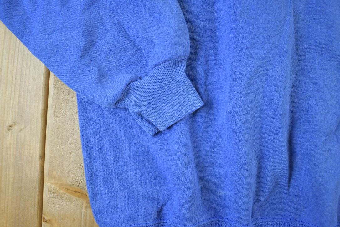 Vintage 1990s Shorts Auto Care Souvenir Crewneck Sweatshirt Made In USA Men's XL from propervintagecanada