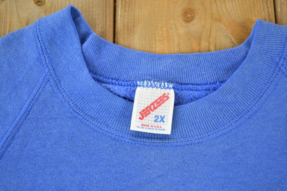 Vintage 1990s Shorts Auto Care Souvenir Crewneck Sweatshirt Made In USA Men's XL from propervintagecanada