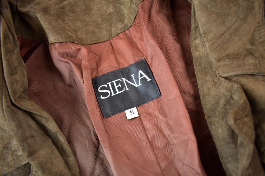 Vintage 1990s Siena Brown Suede Leather Fringe Jacket Women's M from propervintagecanada