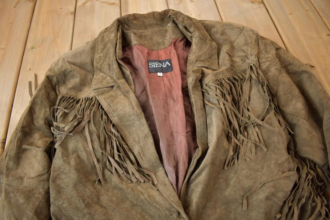 Vintage 1990s Siena Brown Suede Leather Fringe Jacket Women's M from propervintagecanada
