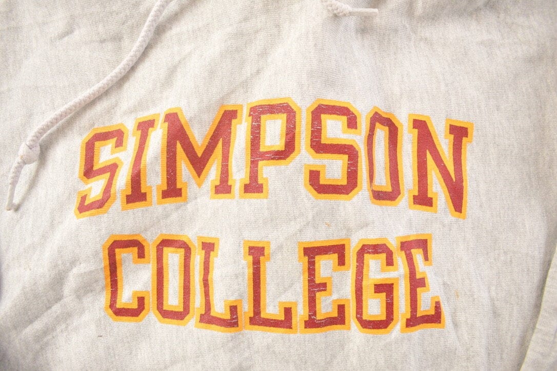 Vintage 1990s Simpson College Champion Reverse Weave Crewneck Men's Large from propervintagecanada
