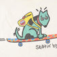 Vintage 1990s Skatin By Souvenir Skateboarding Dog T-Shirt Men's L from propervintagecanada