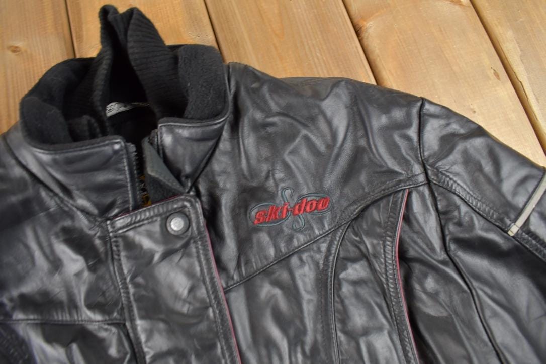 Vintage 1990s Ski Doo Sno Gear Genuine Leather Snowmobile Racing Jacket Made In Canada Size Women's Medium from propervintagecanada
