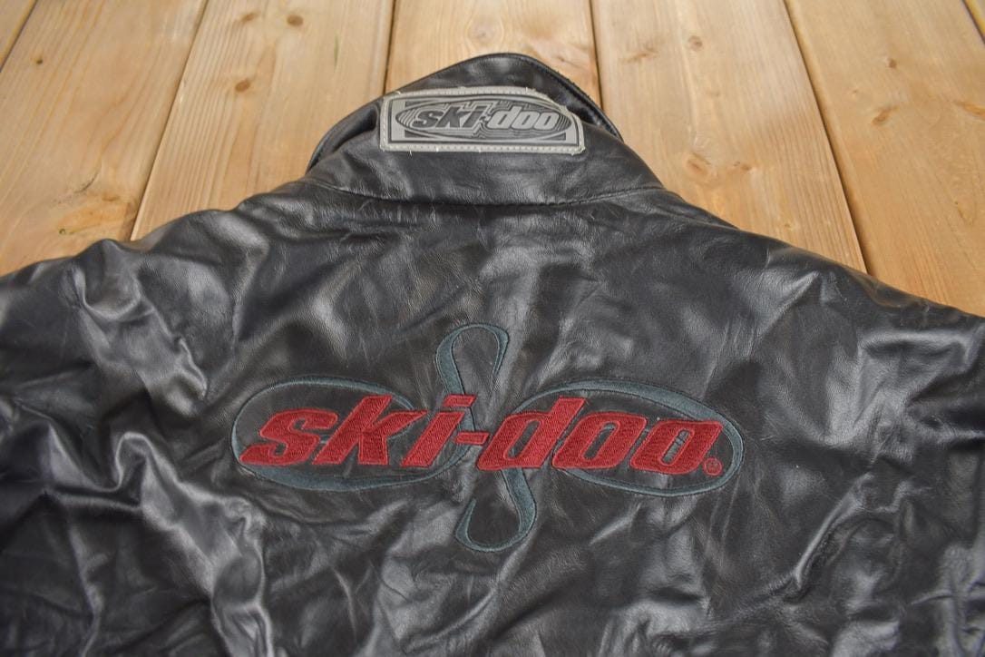 Vintage 1990s Ski Doo Sno Gear Genuine Leather Snowmobile Racing Jacket Made In Canada Size Women's Medium from propervintagecanada