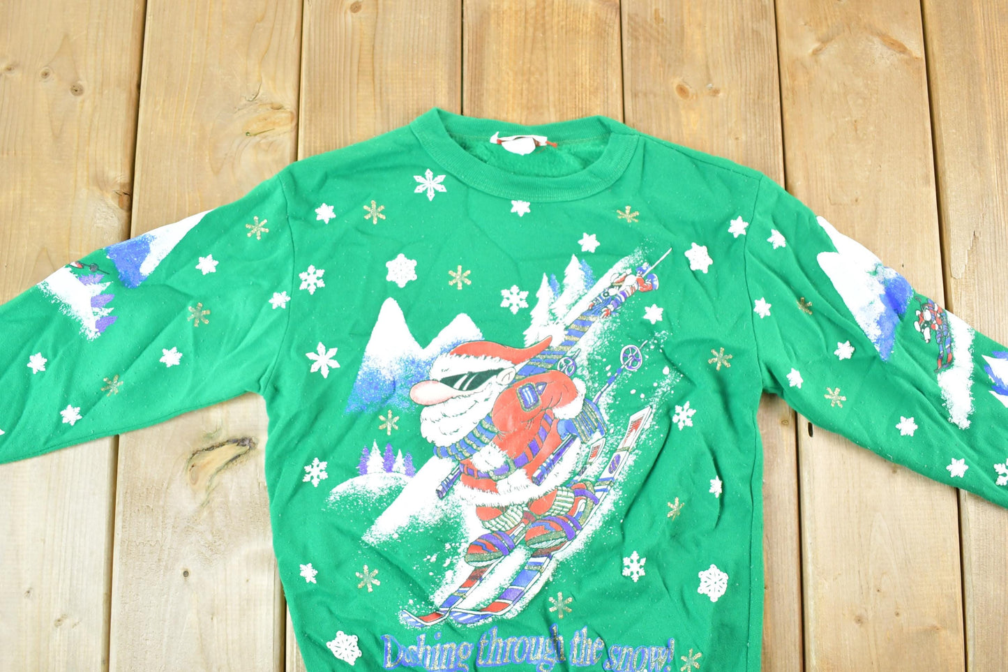 Vintage 1990s Skiing Santa AOP Crewneck Sweatshirt Youth L Men's Small from propervintagecanada