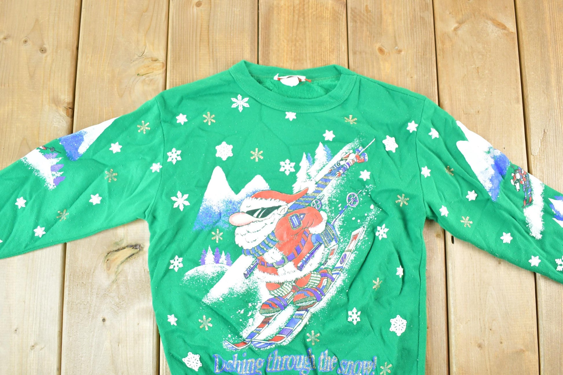Vintage 1990s Skiing Santa AOP Crewneck Sweatshirt Youth L Men's Small from propervintagecanada