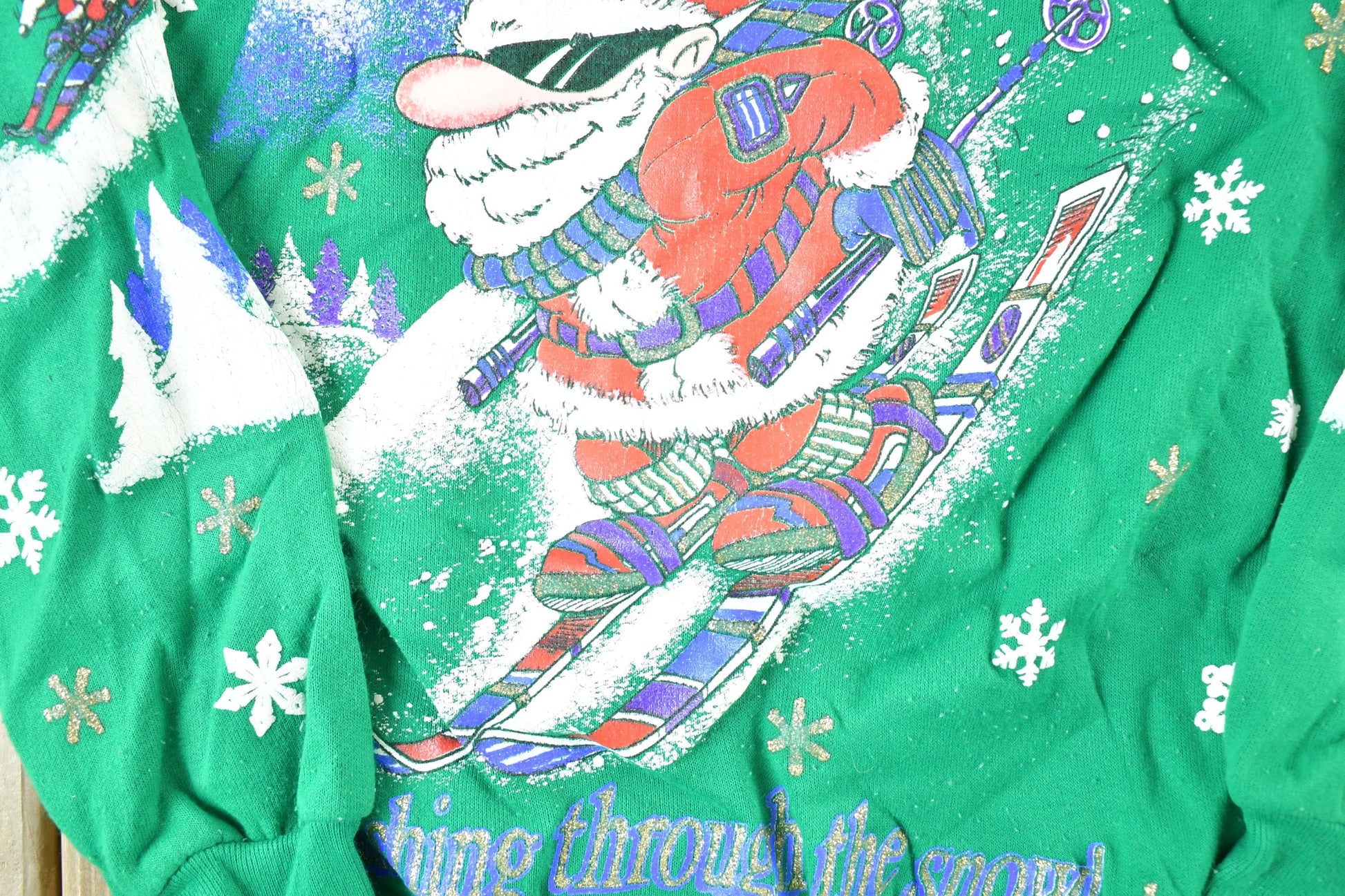 Vintage 1990s Skiing Santa AOP Crewneck Sweatshirt Youth L Men's Small from propervintagecanada