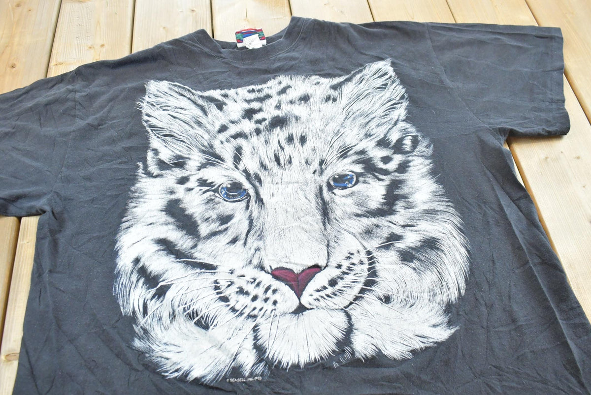 Vintage 1990s Snow Leopard T-Shirt Men's 2XL from propervintagecanada