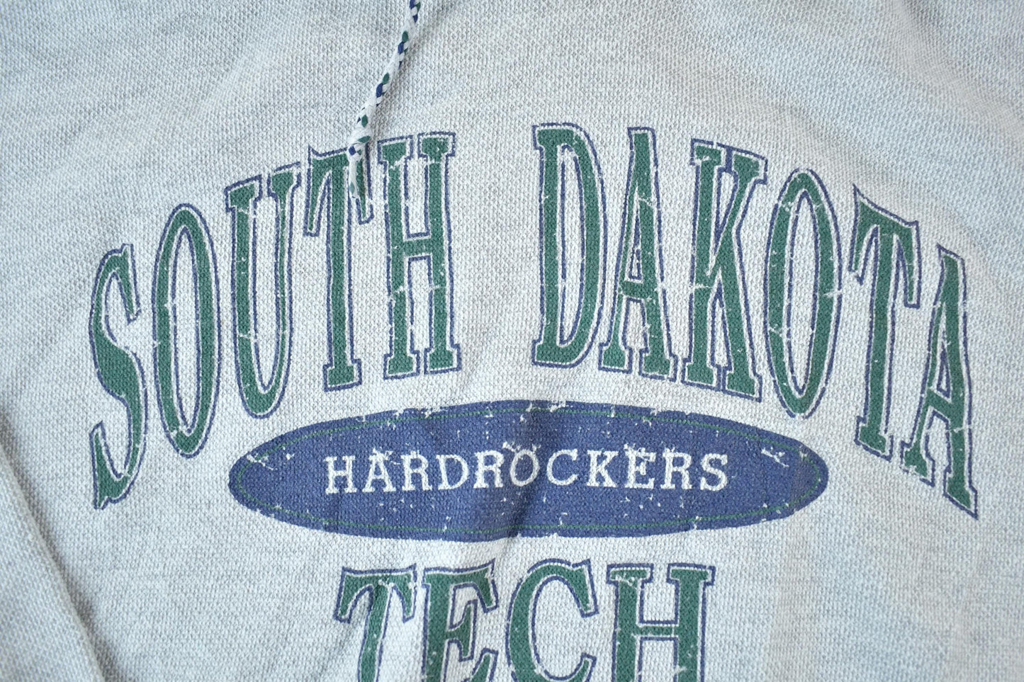 Vintage 1990s South Dakota Tech Hardrockers Souvenir Plaid Lined Hooded Sweatshirt Made In USA Men's Large from propervintagecanada