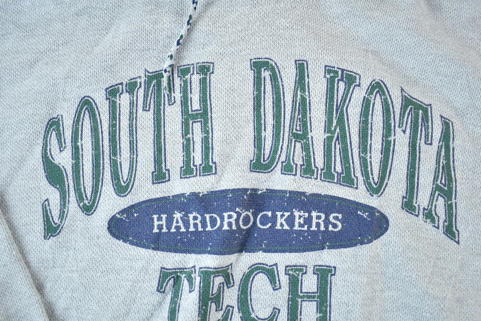 Vintage 1990s South Dakota Tech Hardrockers Souvenir Plaid Lined Hooded Sweatshirt Made In USA Men's Large from propervintagecanada