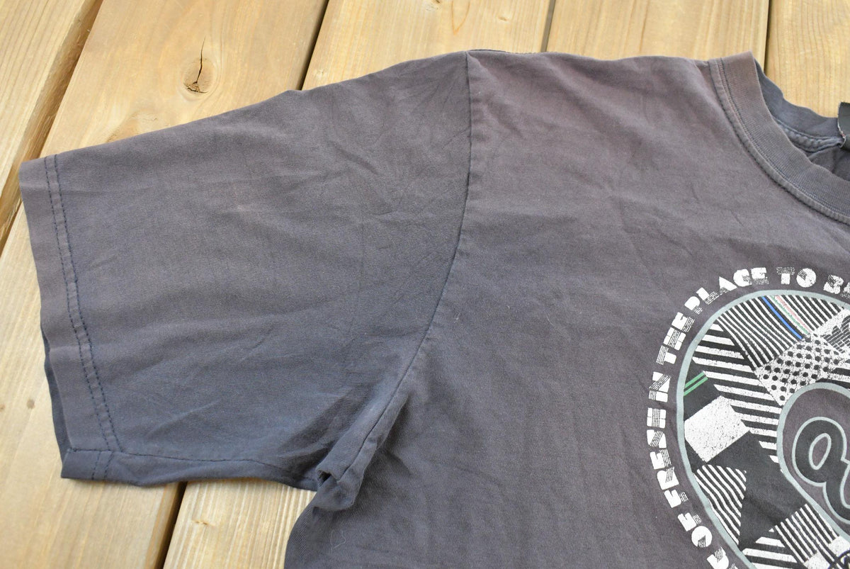 Vintage 1990s Southpole Graphic Print T-Shirt Mens L from propervintagecanada