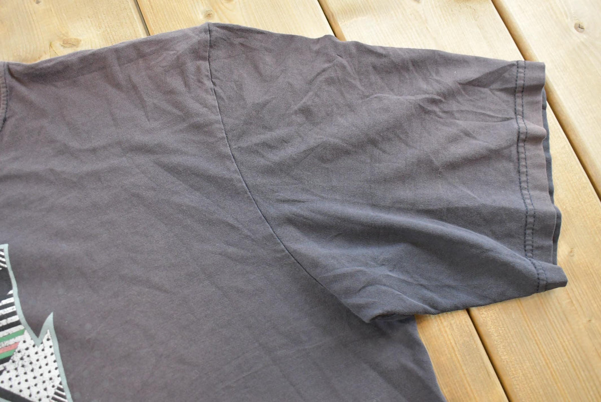 Vintage 1990s Southpole Graphic Print T-Shirt Mens L from propervintagecanada