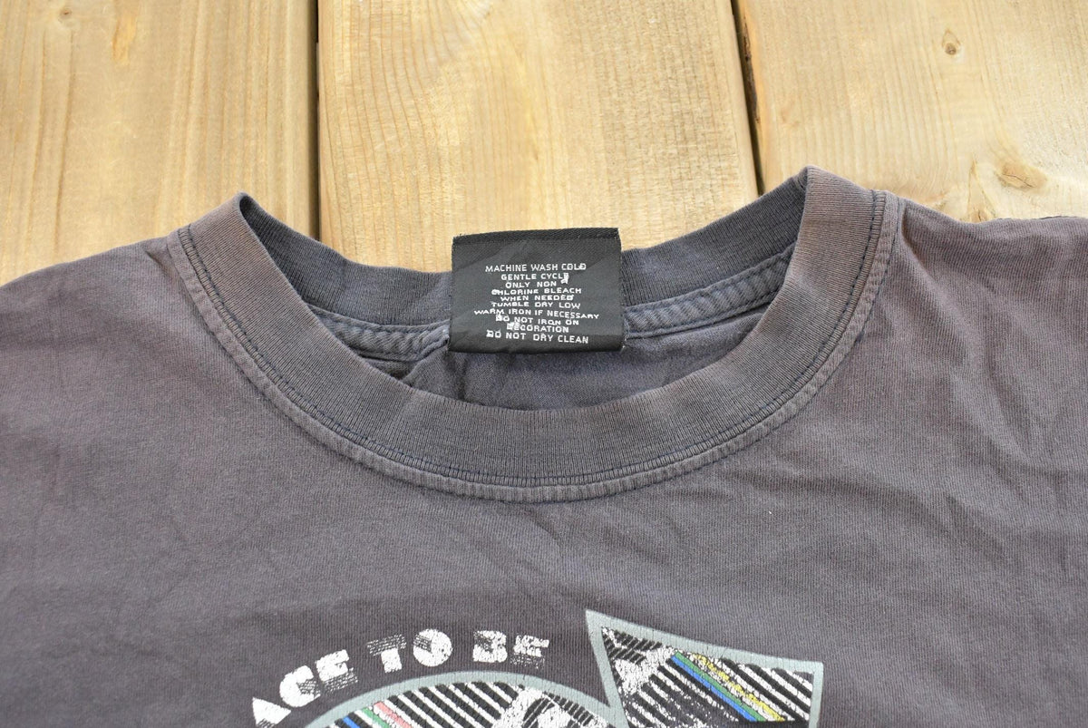 Vintage 1990s Southpole Graphic Print T-Shirt Mens L from propervintagecanada