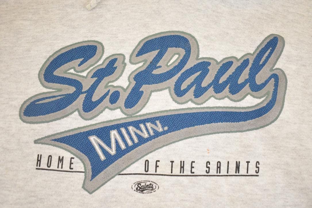 Vintage 1990s St Paul Minnesota Home Of The Saints Hoodie Sweatshirt Men's L from propervintagecanada