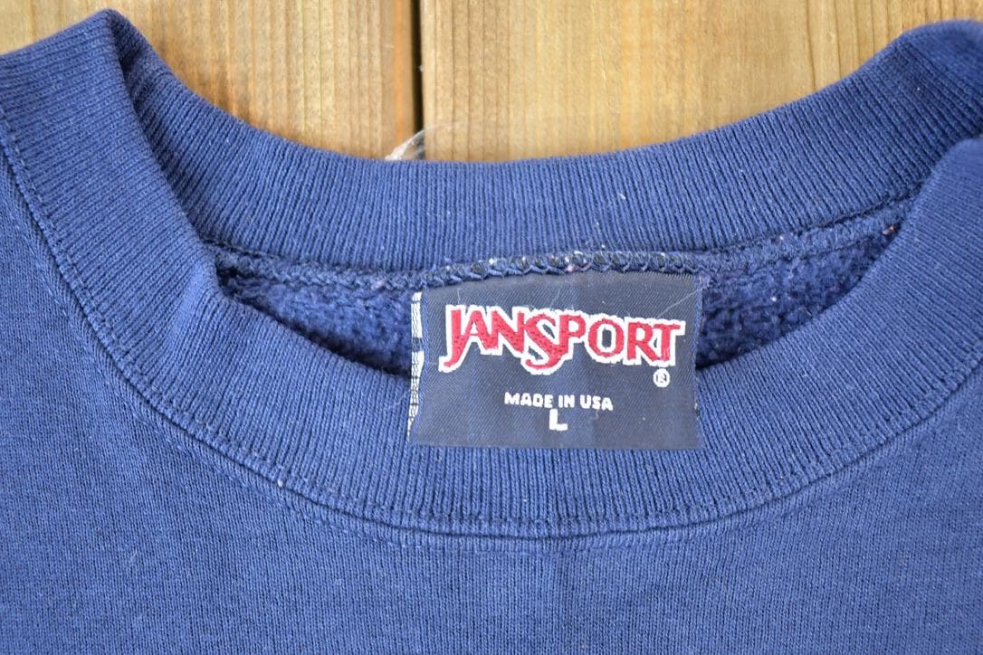 Vintage 1990s St Scholastica Jansport Souvenir Crewneck Sweatshirt Made In USA Men's Large from propervintagecanada