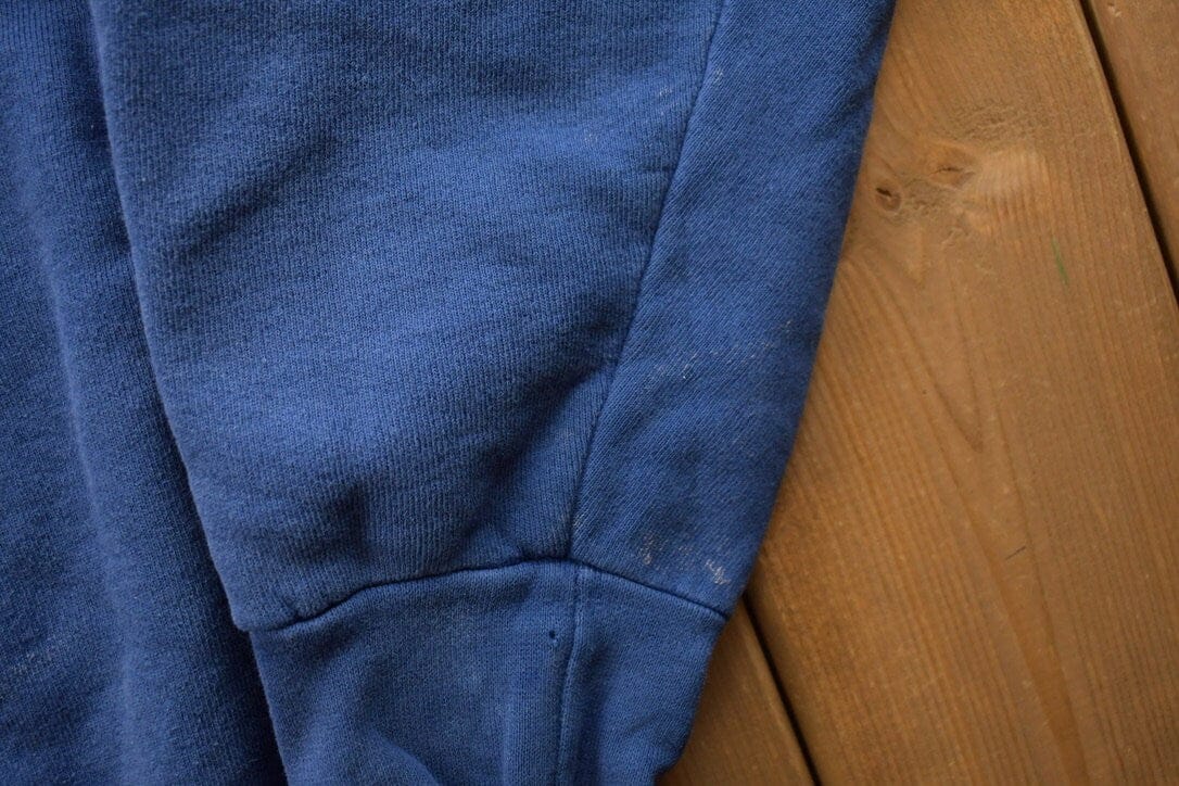 Vintage 1990s Starter Blank Blue Crewneck Sweatshirt from propervintagecanada