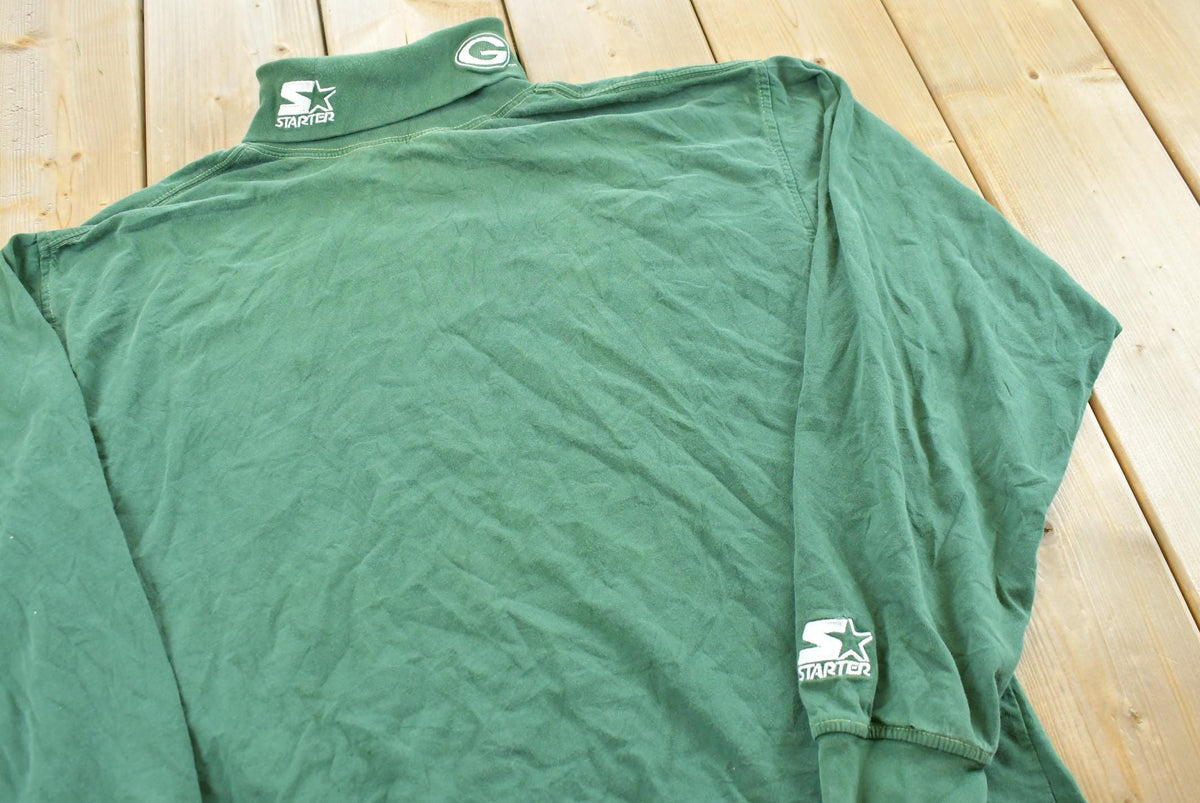 Vintage 1990s Starter Green Bay Packers Long Sleeve Turtleneck Shirt Men's L from propervintagecanada
