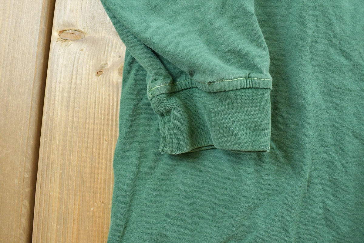 Vintage 1990s Starter Green Bay Packers Long Sleeve Turtleneck Shirt Men's L from propervintagecanada
