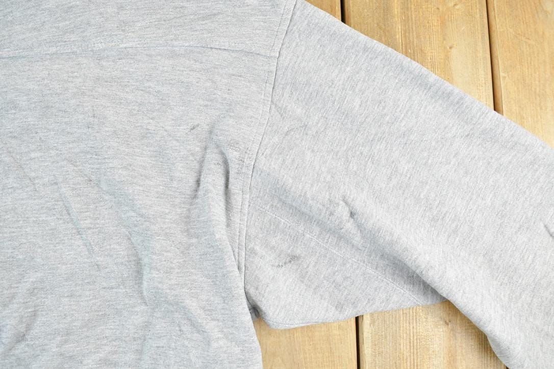 Vintage 1990s Starter Kansas University Crewneck Men's XL from propervintagecanada