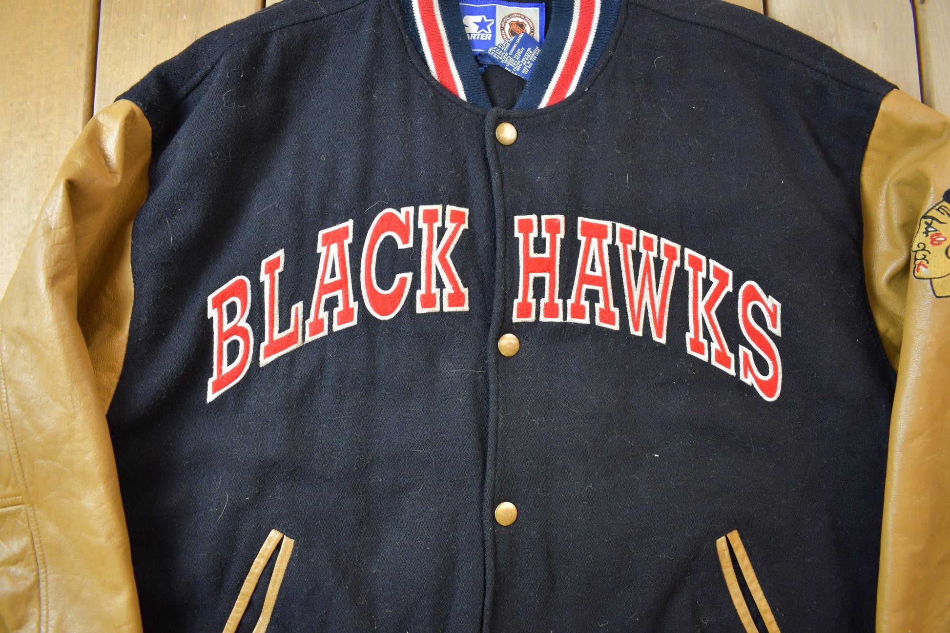 Vintage 1990s Starter NHL Chicago Black Hawks Hockey Wool Varsity Jacket from propervintagecanada