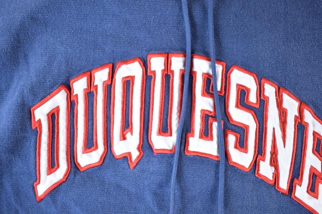 Vintage 1990s Steve And Barry's Duquesne Cross Grain University Hoodie Mens L from propervintagecanada