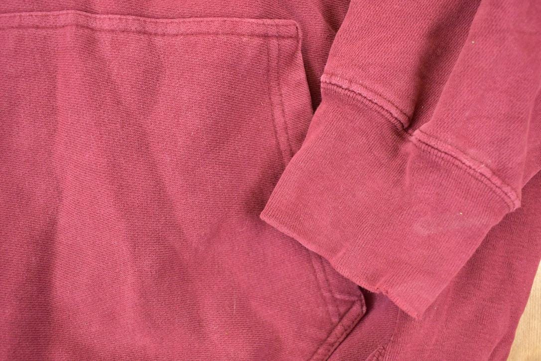Vintage 1990s Steve And Barry's Minnesota Cross Grain Embroidered University Hoodie Sweater Mens S from propervintagecanada