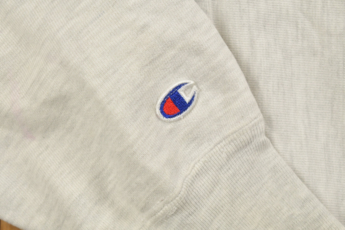 Vintage 1990s Stonehill University Collegiate Champion Reverse Weave Hoodie Men's Medium from propervintagecanada