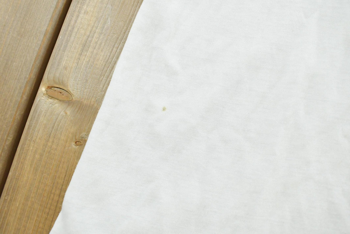 Vintage 1990s Super Faded Threadbare Blank White Pocket T-Shirt Mens L from propervintagecanada