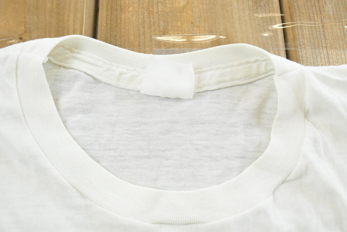 Vintage 1990s Super Faded Threadbare Blank White Pocket T-Shirt Mens L from propervintagecanada
