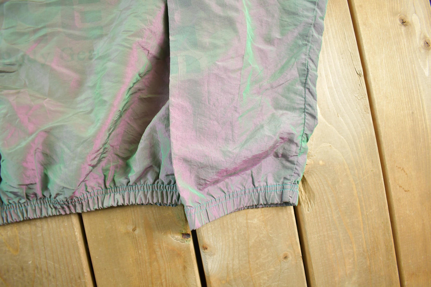 Vintage 1990s Surf's Up International Body Gear Iridescent Windbreaker Jacket Men's XL from propervintagecanada