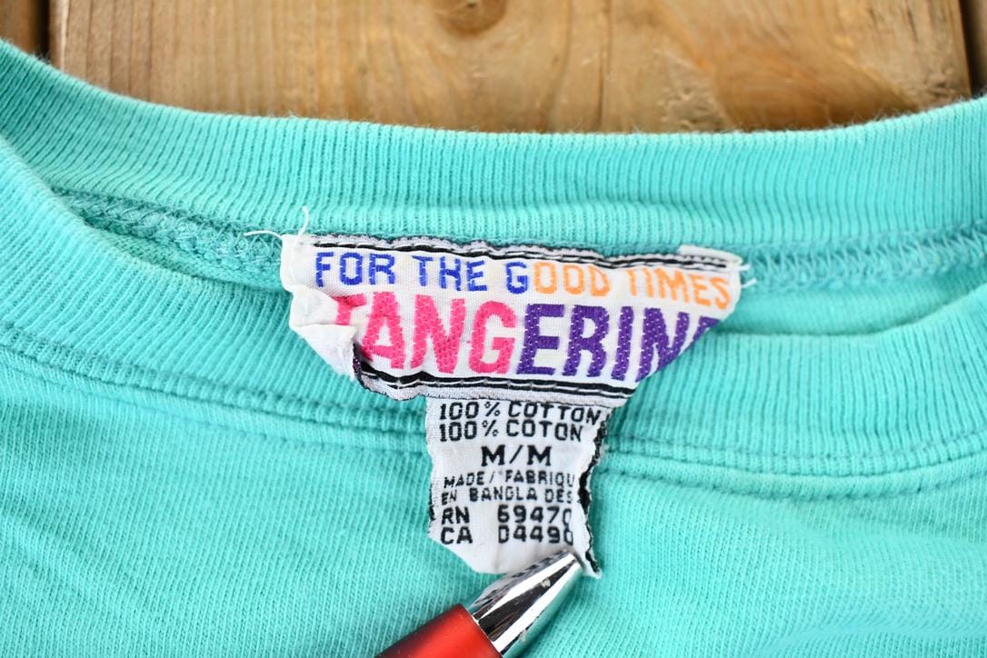 Vintage 1990s Tangerine Single Stitch Blank Teal Pocket T-Shirt Men's Small from propervintagecanada