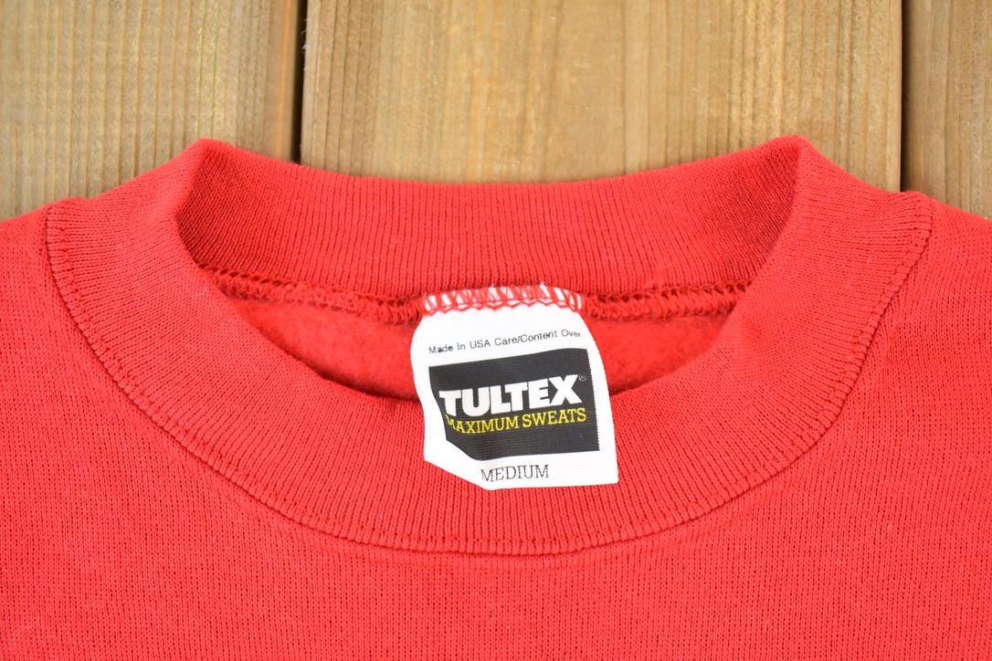 Vintage 1990s Teach The Future Crewneck Sweatshirt Men's Medium from propervintagecanada