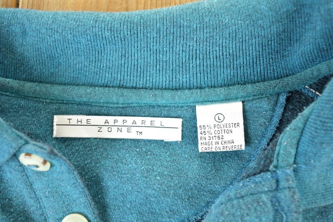 Vintage 1990s The Apparel Zone Quarter Button Crewneck Sweatshirt Mens L from propervintagecanada