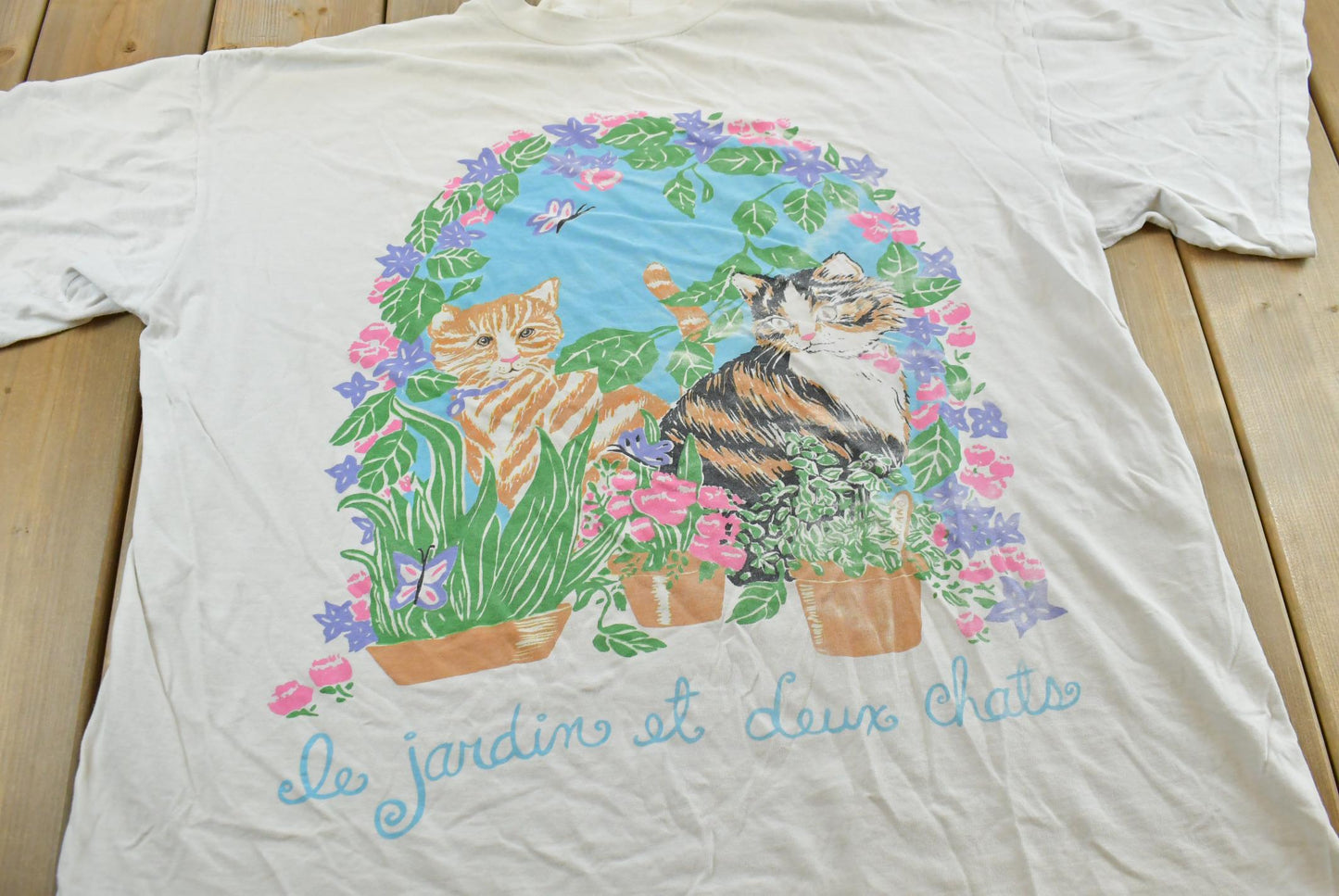 Vintage 1990s The Garden of Two Cats French T-Shirt Men's 2XL from propervintagecanada