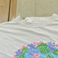 Vintage 1990s The Garden of Two Cats French T-Shirt Men's 2XL from propervintagecanada