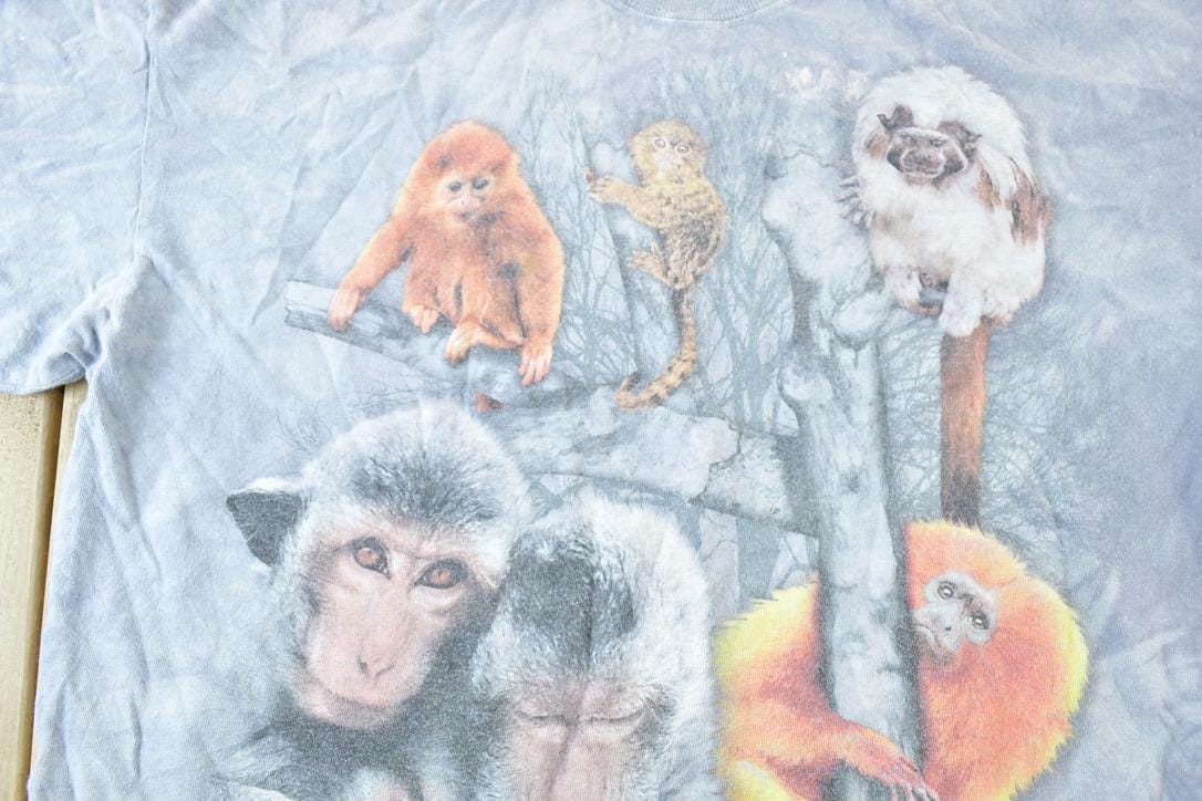 Vintage 1990s The Mountain Animal Theme Souvenir Single Stitch Graphic Print T-Shirt Men's XL from propervintagecanada